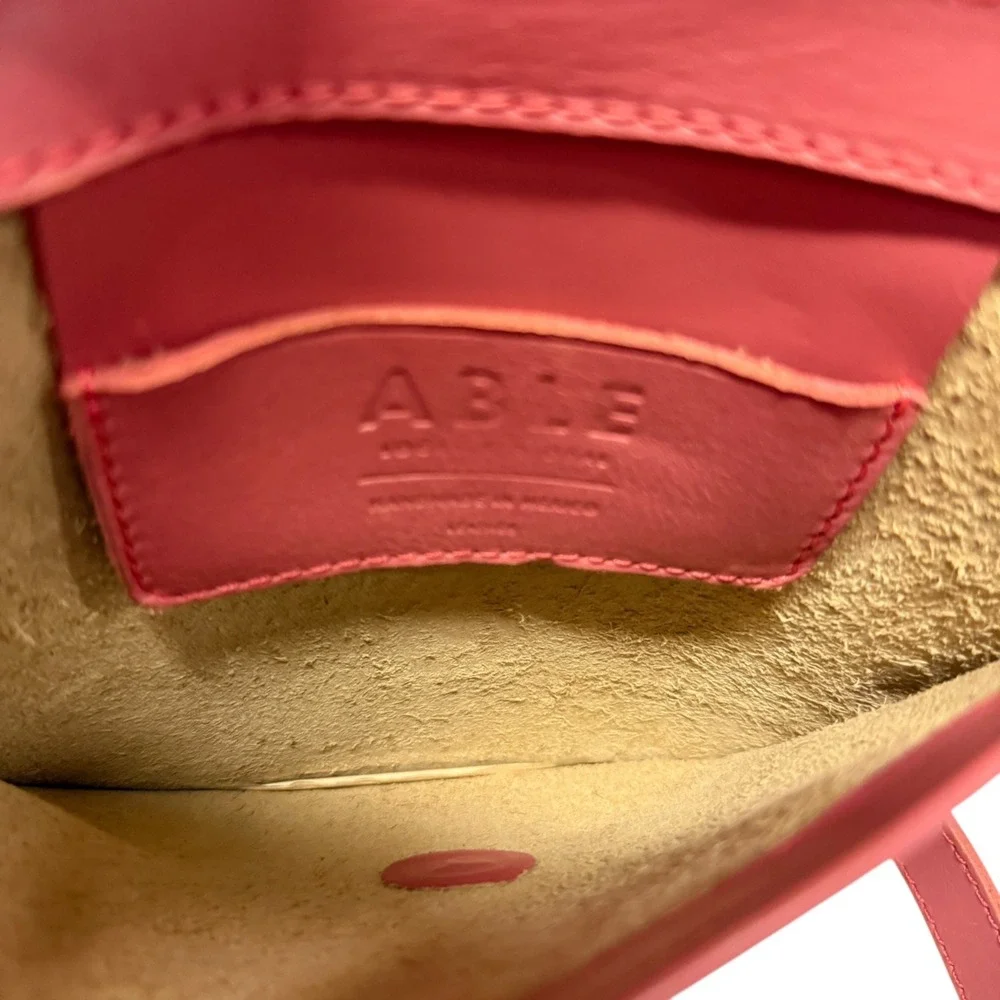 ABLE Leather Crossbody Bag Circle Handle Adjustable Strap Coral Pink